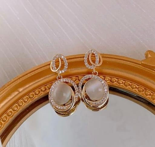 Trending Pearl and Gold Plated Stone work Stud Earrings